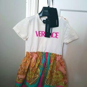 Beautiful 2T versace dress worn once like new. tags included with hanger.
